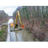 WESTTECH Woodcracker C 550 sur pelle en travaux de berge. Configuration constructeur illustrée.
